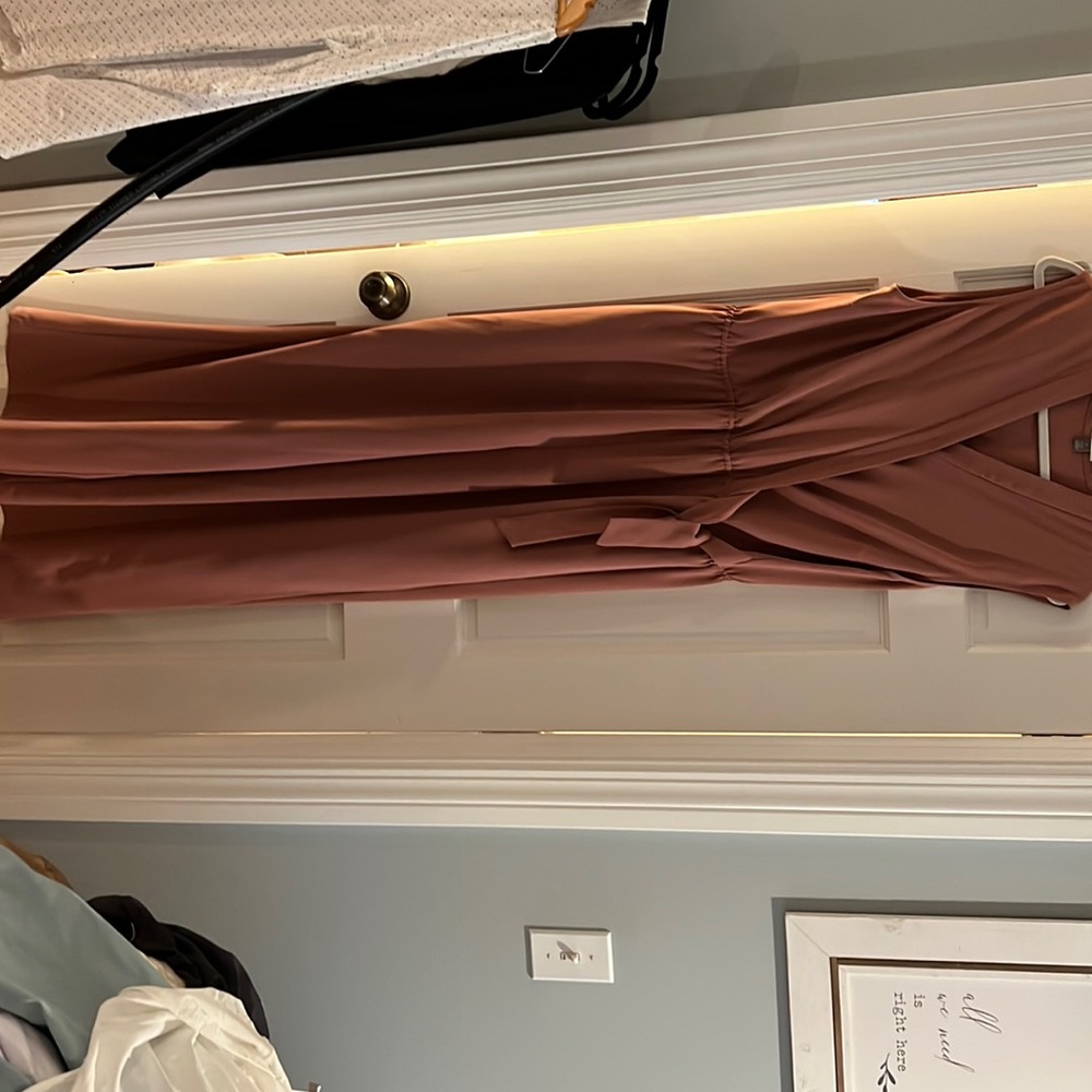 Sleeveless XL Rose colored pant romper. Wider legged cinched waist with a tie